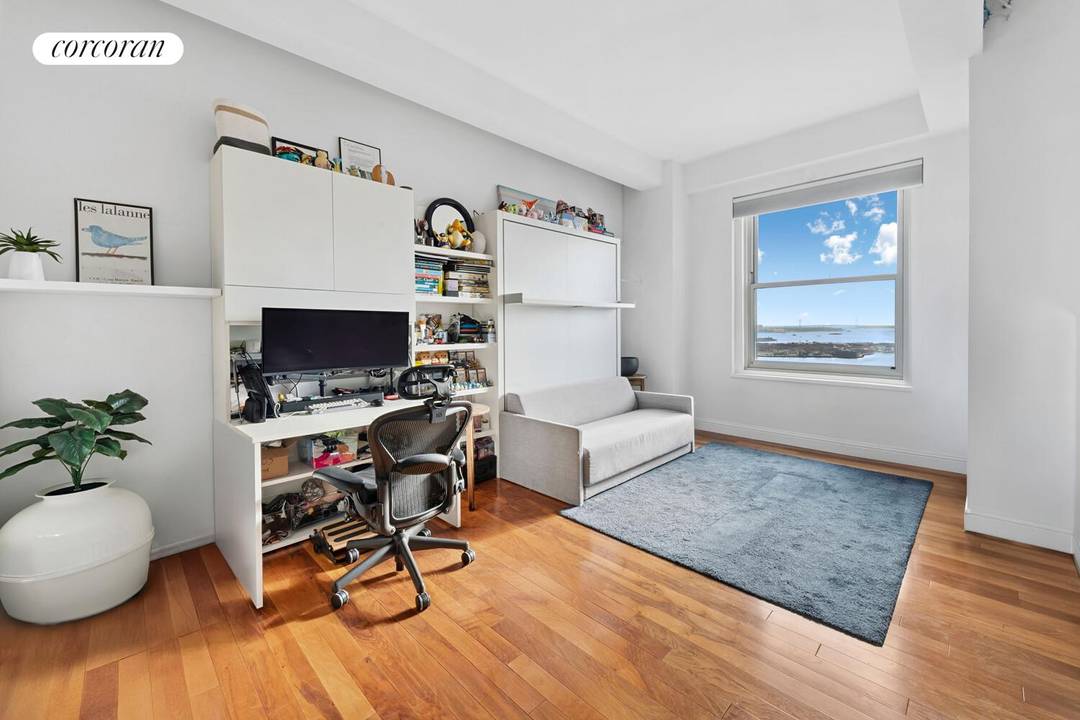 This sun drenched studio at 88 Greenwich Street offers sweeping, unobstructed views of New York Harbor and an ambiance that instantly feels elevated.