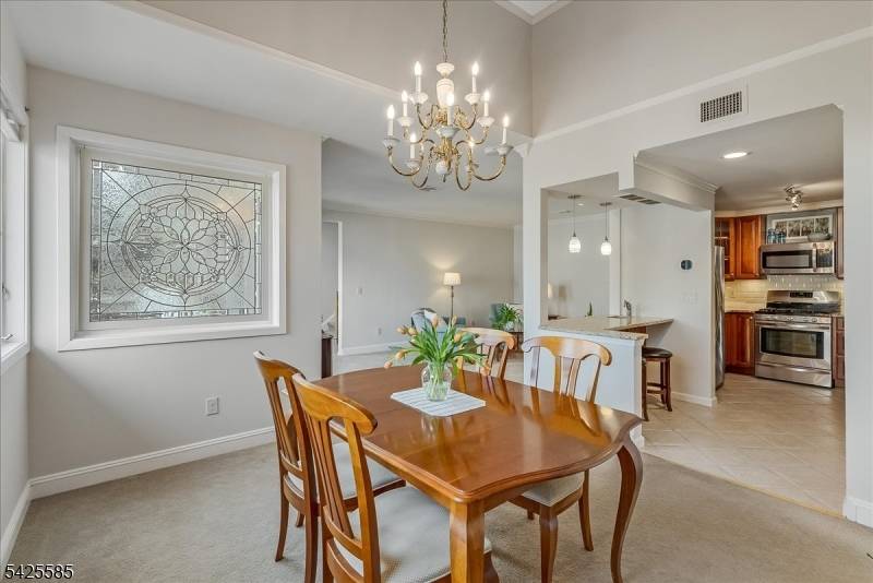 Situated in the heart of downtown Morristown, this updated townhouse offers a seamless blend of sophistication and convenience of urban living.