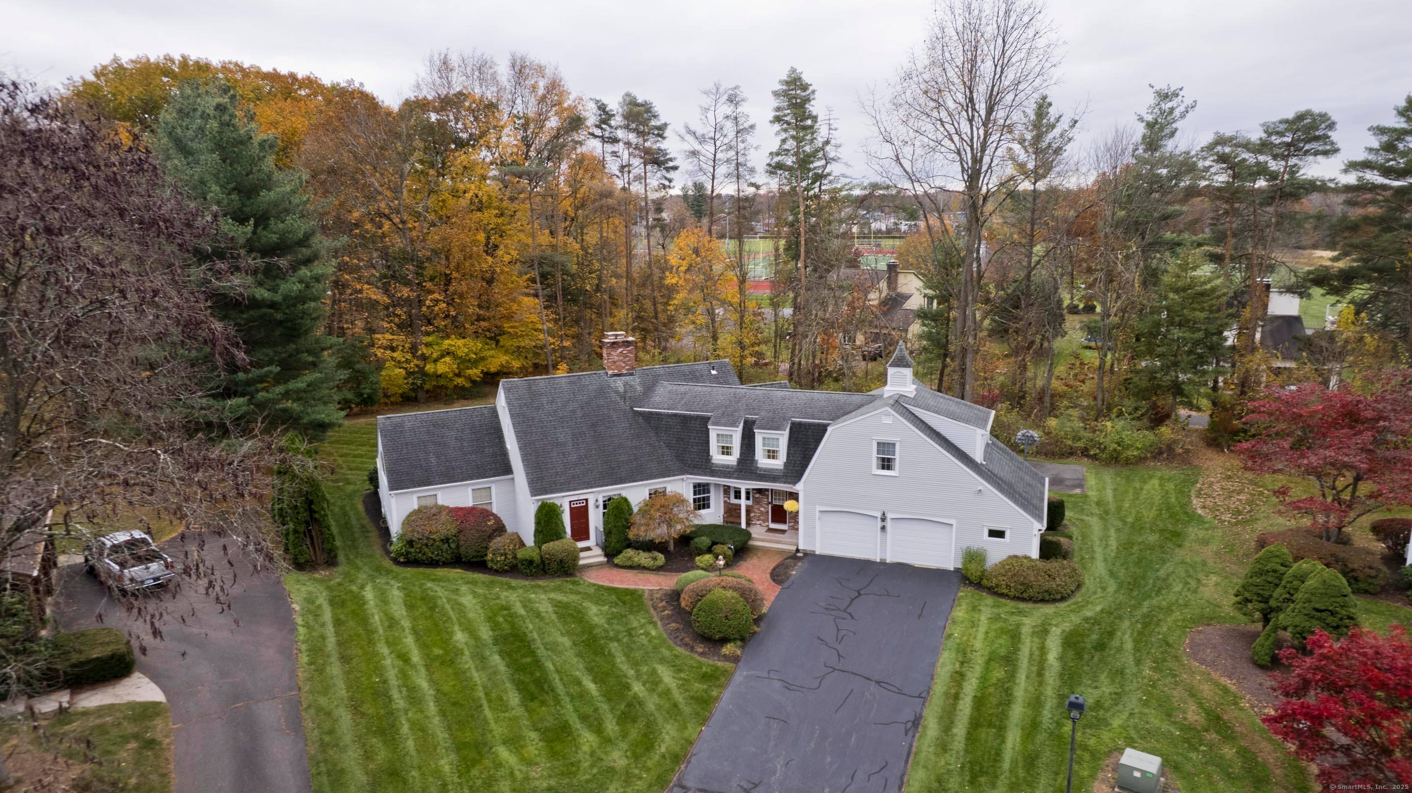 You will fall in love with this custom built home in a premier Suffield location !