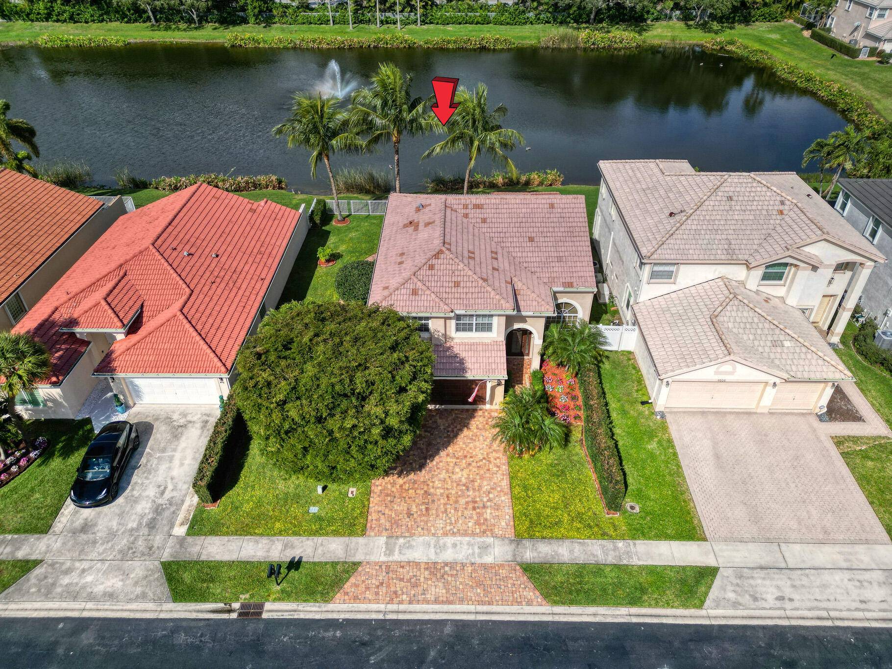 Nestled in a tranquil lakefront setting, this exceptional single family home offers 4 bedrooms, 3.