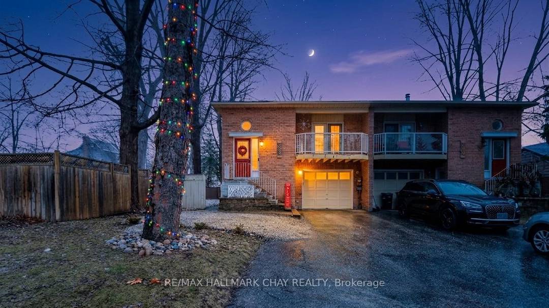 Welcome to this CUSTOM BUILT semi detached raised bungalow in Barrie !