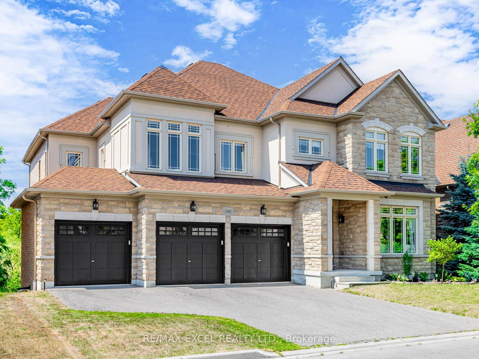 An extraordinary 5 2 bedroom, 5 bath executive residence showcasing over 7, 000 sq ft of refined living space, including a finished walk out basement, on a premium ravine lot.