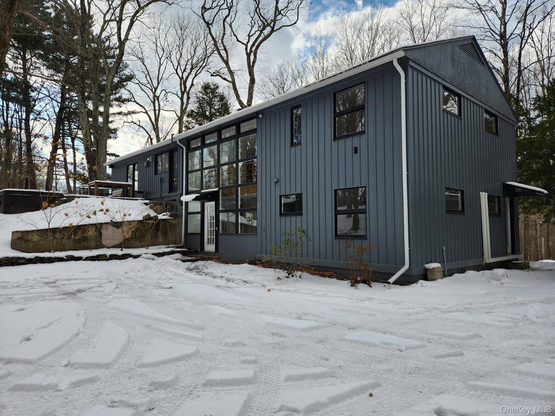 Beautiful Danish designed home privately situated on a hill with seasonal mountain views, just 4 miles from the Village of Rhinebeck and Amtrak train station.