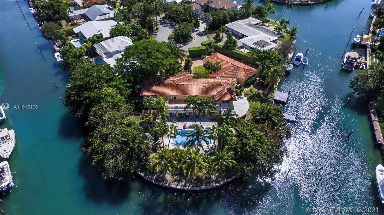 Living on the edge has a new meaning with 327 ft of incredibly lush waterfront views showcasing this secluded, private tropical peninsular estate.