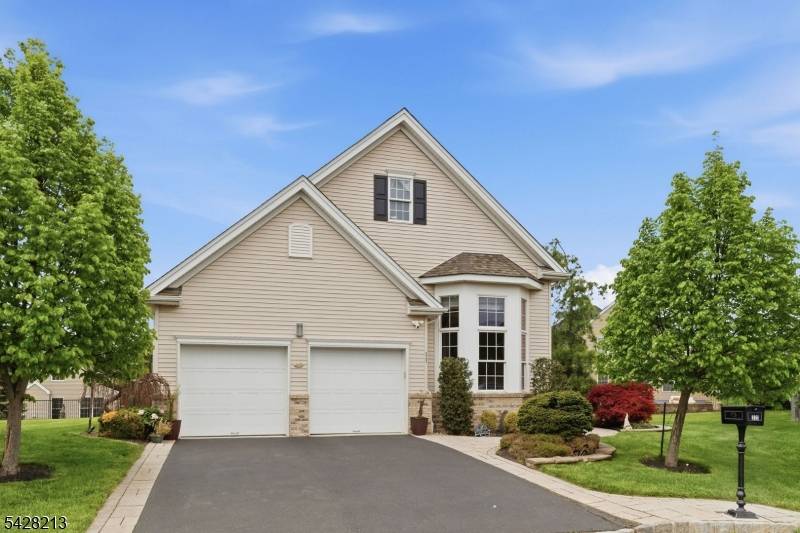 Welcome to this beautifully maintained Rome model residence nestled in a private cul de sac within the highly sought after gated 55 community of Canal Walk.