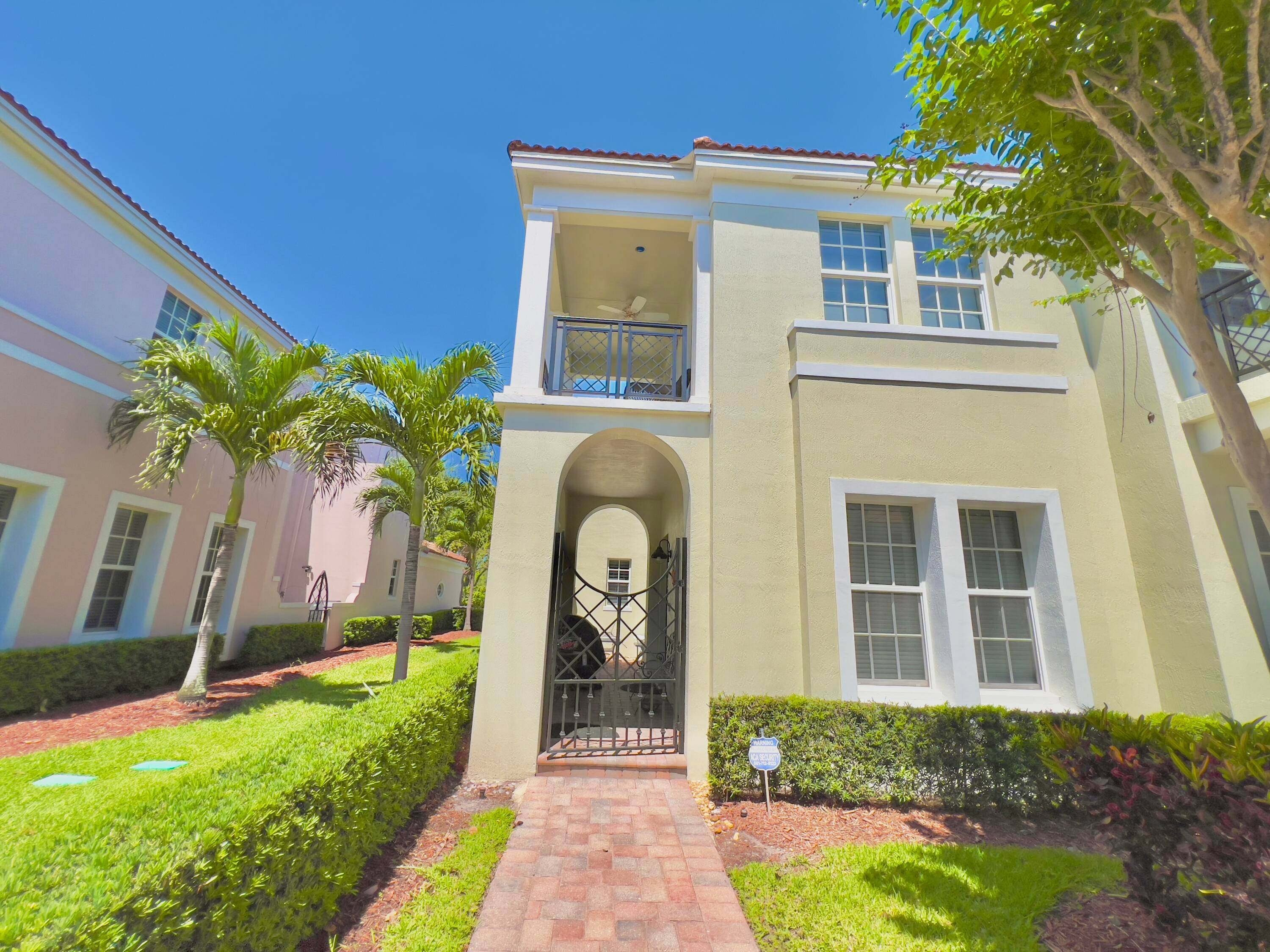 A stunning, spacious townhome in the highly sought after Central Park community in Boca Raton.