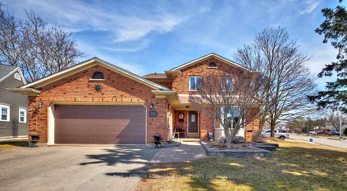 28 Dixon Crescent is a stunning, quality built two story brick home in a sought after family neighborhood.