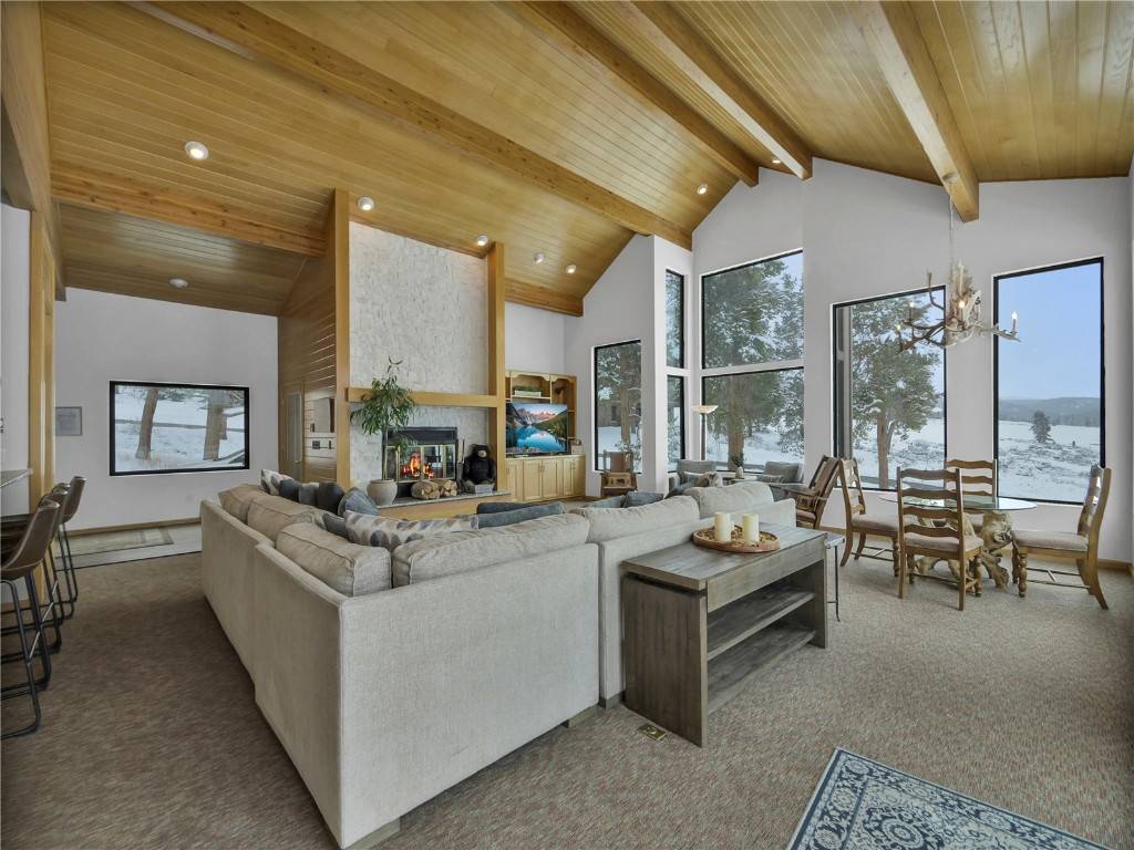 Set amid the stunning landscapes of Keystone Ranch, this 8 bedroom home emerges as a haven of modern comfort and alpine charm.