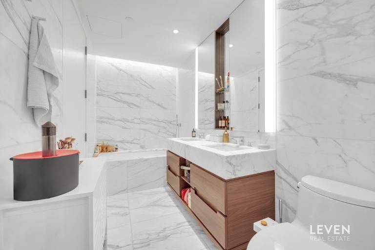 Welcome to Unit 22F at Two Waterline Square, located at 30 Riverside Boulevard in the esteemed Lincoln Square neighborhood.