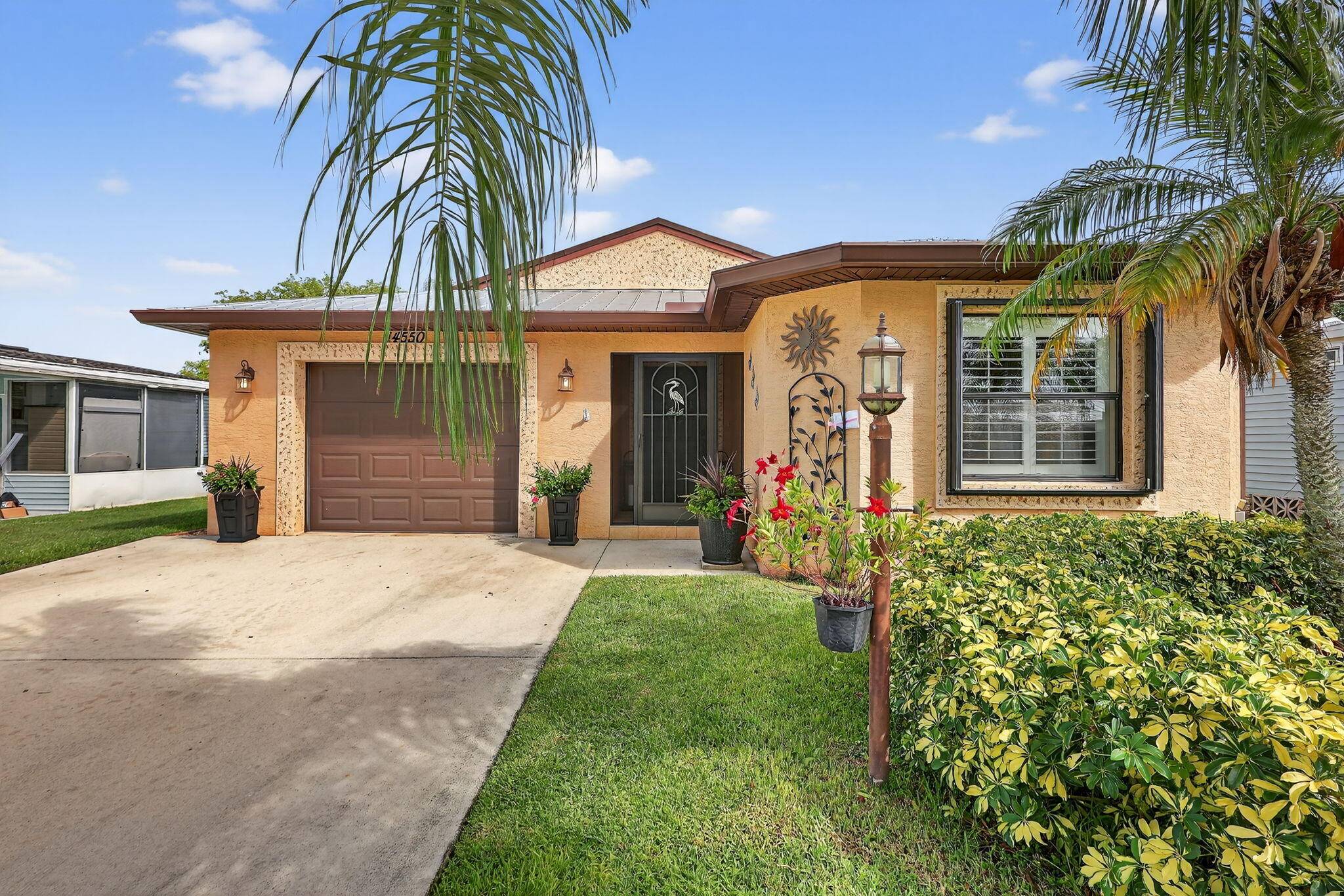 Welcome to this beautifully maintained 3 bedroom, 2 bath home located in the 55 community of Spanish Lakes Fairways.