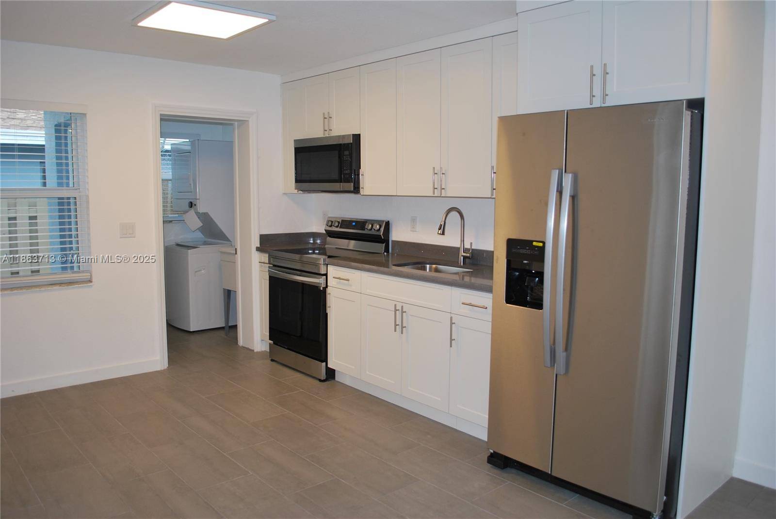 INVESTORS, ATTENTION ! ! I am glad to present to you this completely renovated income producer Duplex in the very active Oakland Park.