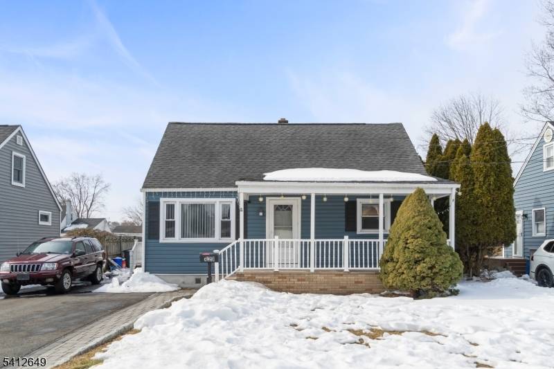 4 bedroom listed as 5 for search visibility, a bonus room in the basement, 3 full bath expanded Cape Cod style home in Middlesex featuring a functional layout and modern ...
