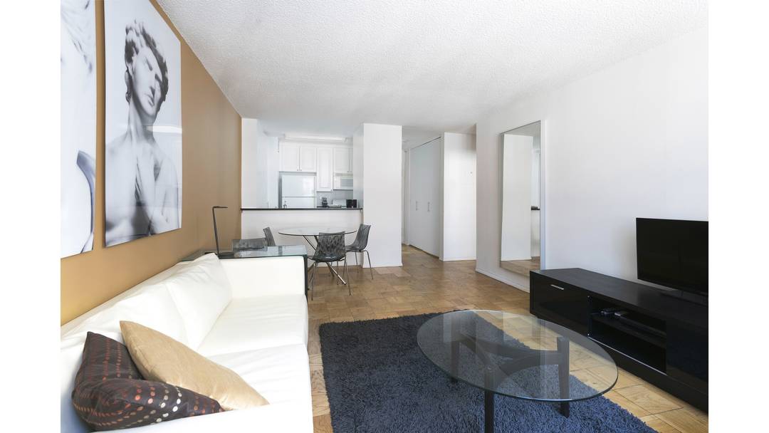 Spacious bright East facing one bedroom, one bathroom apartment in a luxury full service building located in Midtown West.