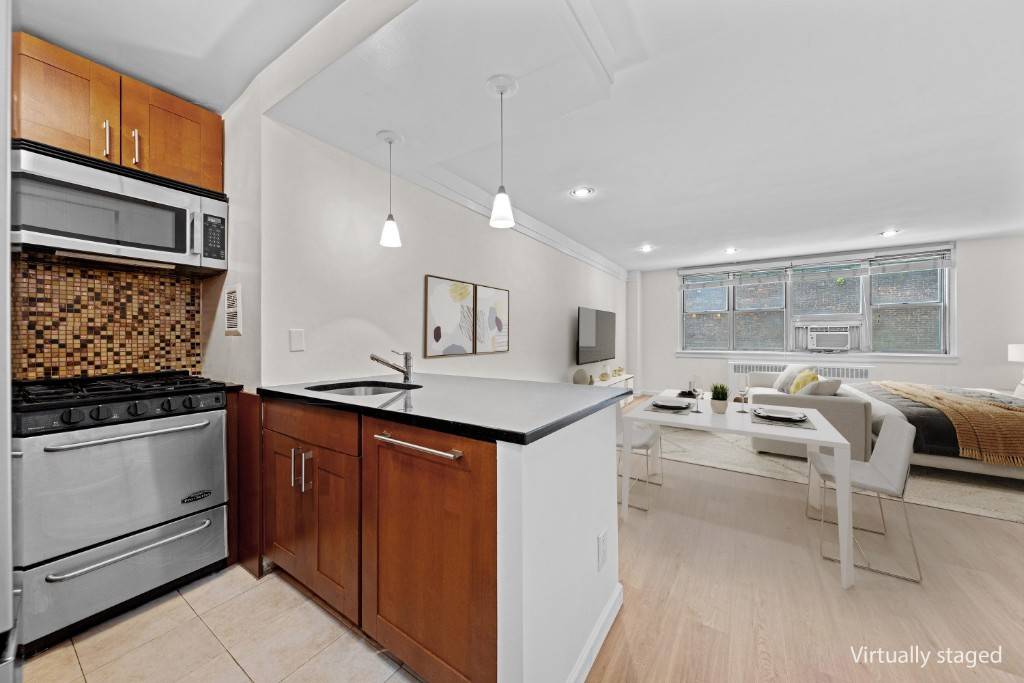 ALCOVE studio that easily fits a KING BED.