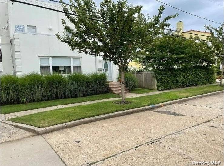 Perfect seasonal summer winter rental rates, Spanish stucco home with great outdoor yard deck and garage.