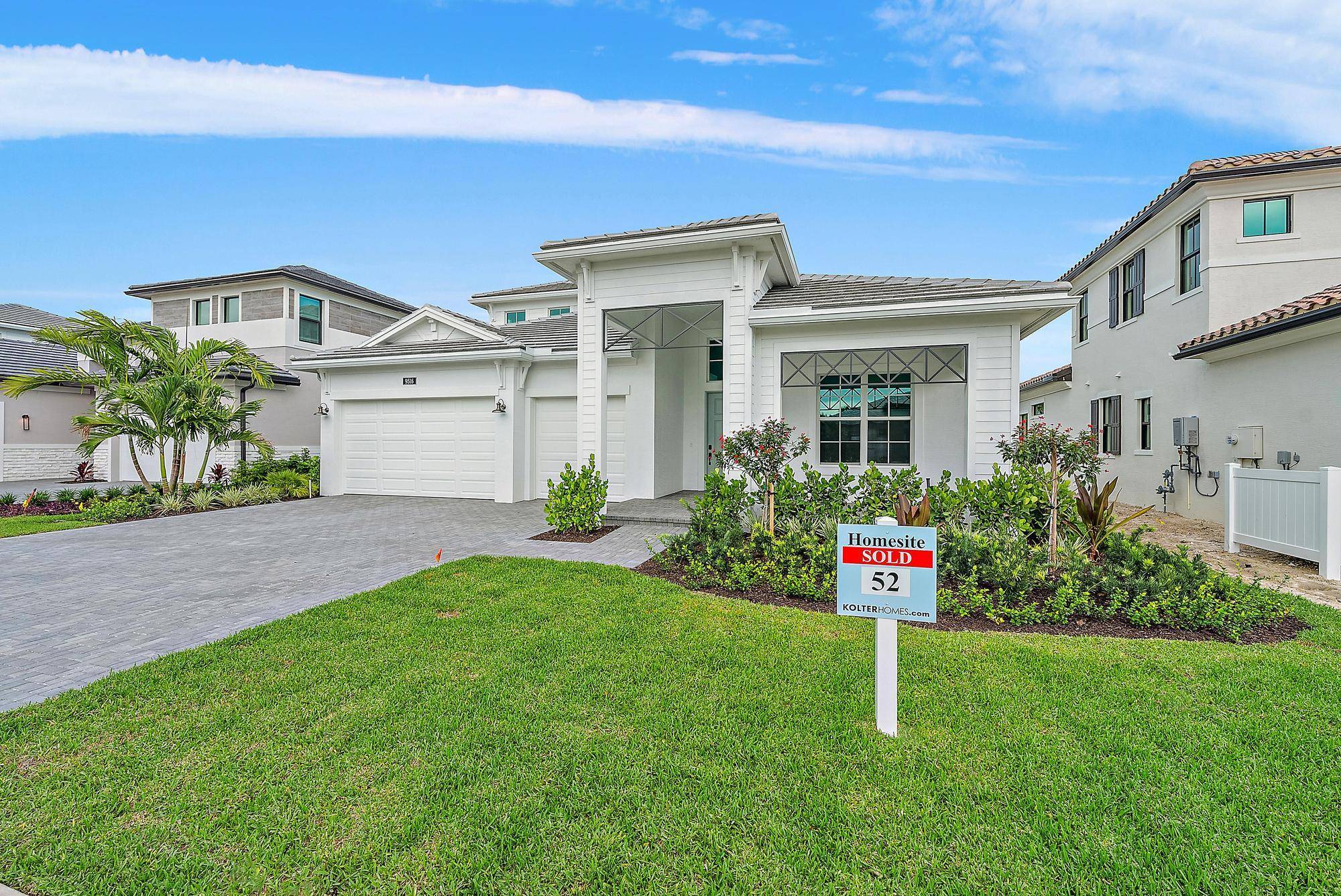 This brand new Paige floorplan built by Kolter Homes is located within the gated community of L'Ambiance at Avenir.