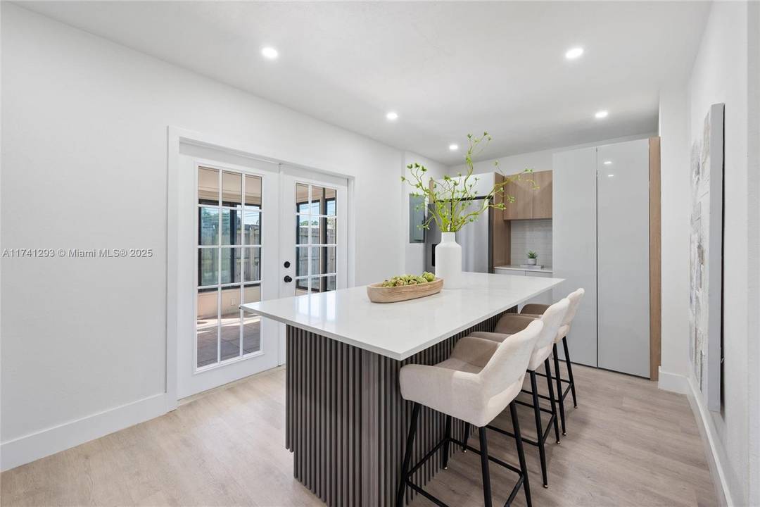 Don t miss the opportunity to live in this corner single family that has been completely renovated with new roof, impact windows and all appliances are new including a c.