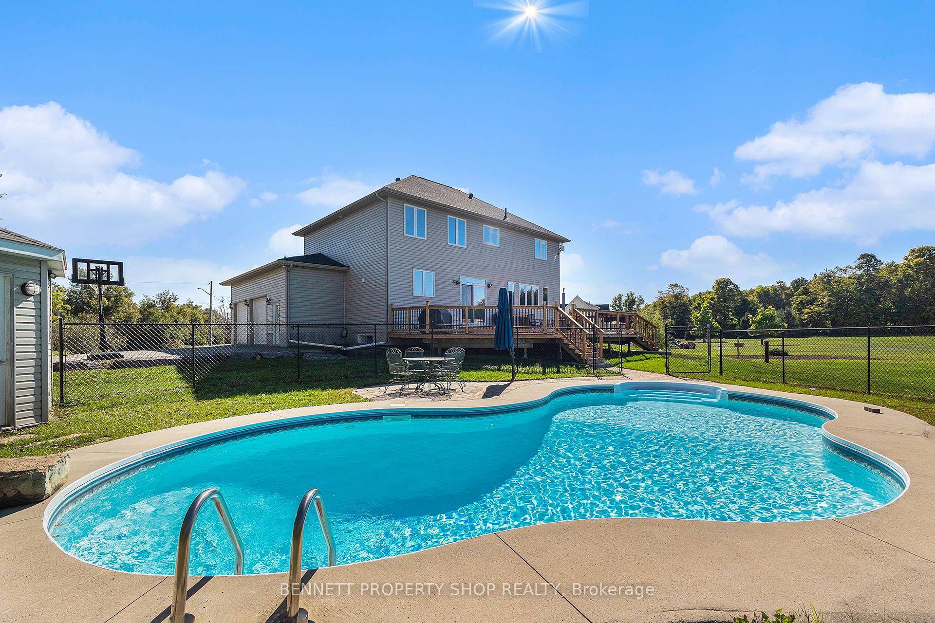Large family home, convenient to Canadian Forces Dwyer Hill Base, with IN GROUND SALTWATER POOL on 2 private ACRES just outside of KANATA STITTSVILLE.