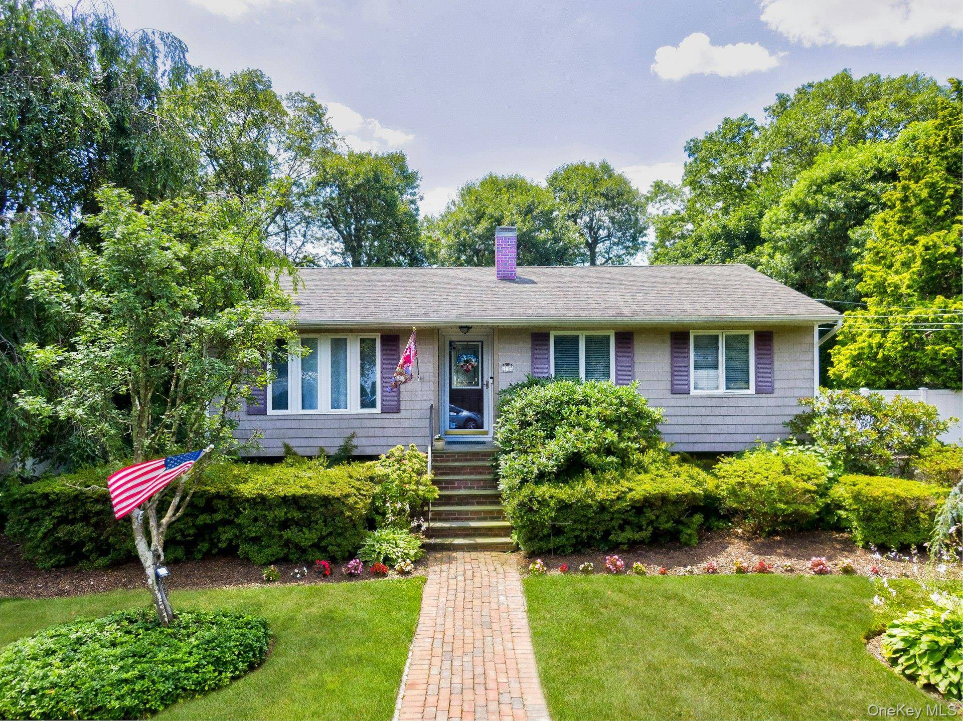 Welcome to this impeccably maintained and renovated 4 bedroom, 2 bath home in the desirable Comsewogue School District, nestled on a spacious third acre lot in beautiful Port Jefferson Station.