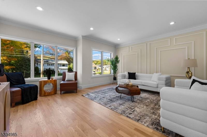 Welcome to this thoughtfully designed new construction featuring a finished ground level ideal for entertaining, plus a serene second floor retreat.