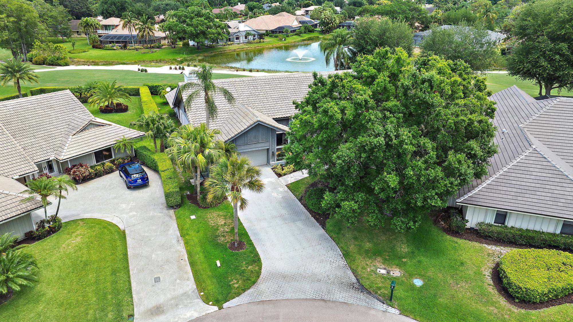 UNFURNISHED ANNUAL RENTAL Amazing Very Private Oversized Lot on a Quiet Cul de Sac, this HomeOoffers a Spacious Split Bedroom Floor Plan with 4 Bedrooms, 2.