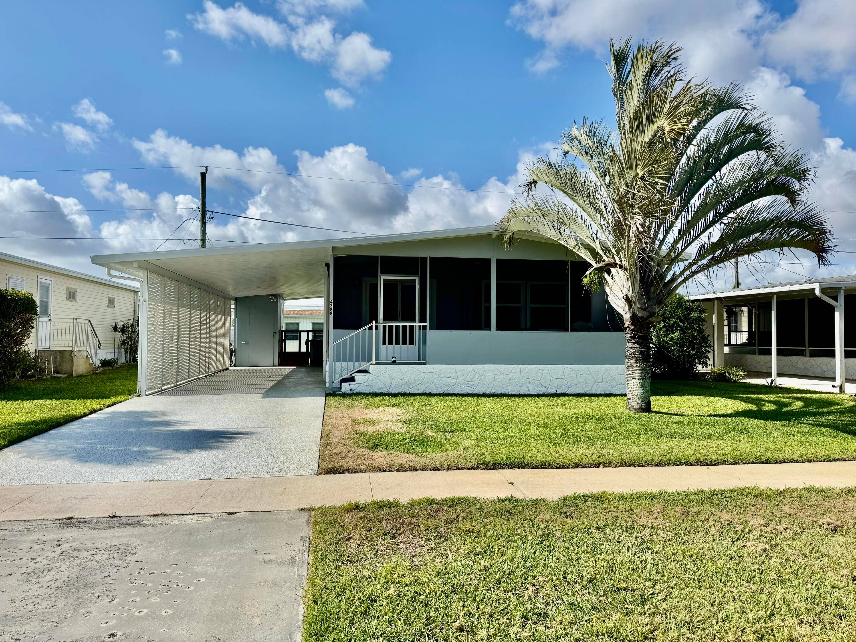 This easy move in, fully furnished, turnkey double wide mobile home is located in Tropical Breeze Estates, an active adult community where you own your deeded lot with a super ...