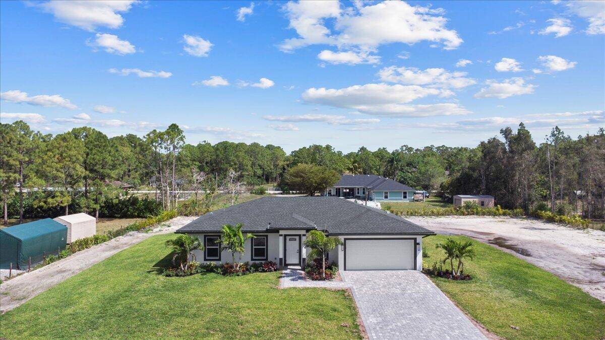 Welcome to your brand new 2025 construction in the highly sought after community of Loxahatchee !