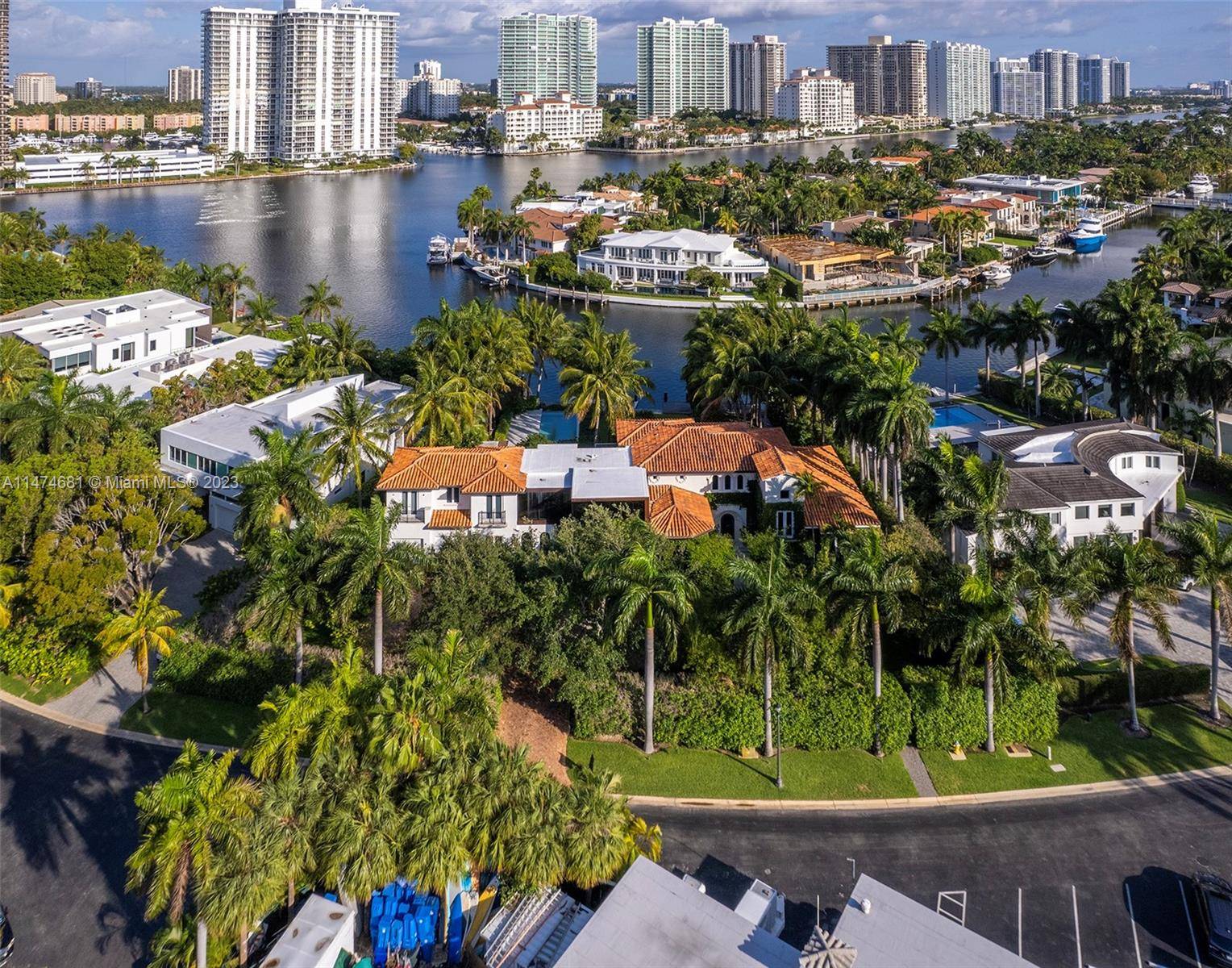 Welcome to the epitome of luxury and privacy in Golden Beach a sprawling near 26, 000 sqft waterfront estate, featuring a bespoke 7, 500 sqft home.