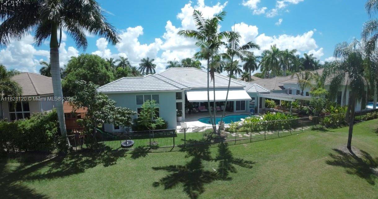 This is a remarkable property on the golf course in Weston Hills Country Club !