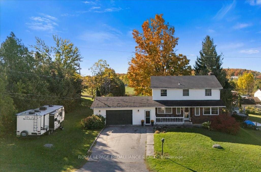 Prime bright cheery 2 storey family home with lovely front veranda that enters to centre hall plan, plus 2nd front entrance steps into oversize mudroom with mega closets and door ...