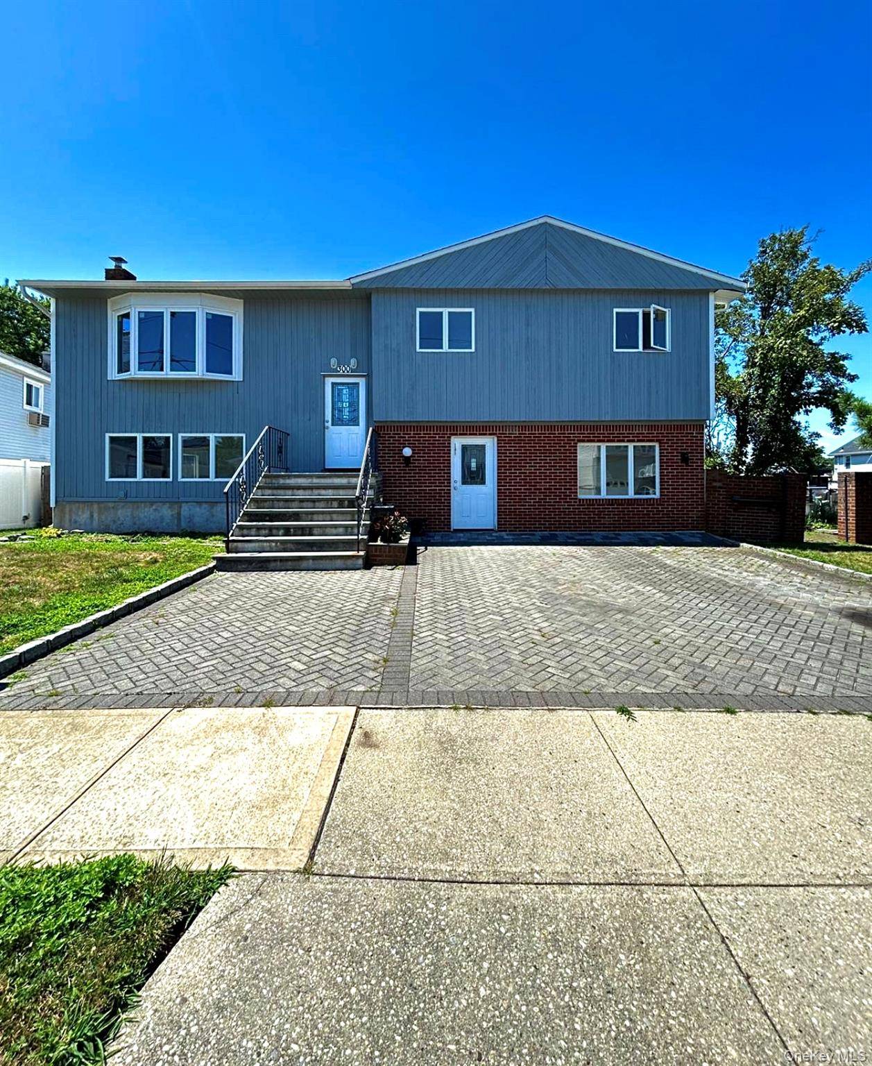 RECENTLY RENOVATED ! ! This raised hi ranch is a boater s dream, located just three houses from the bay on a canal in Freeport.