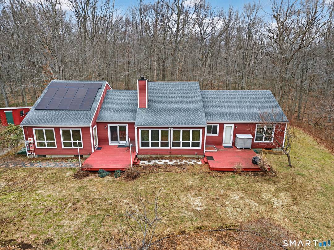Tucked away on over 7. 5 private acres and abutting protected state forest, this rare Clinton property offers the perfect blend of tranquility, space, and flexibility.