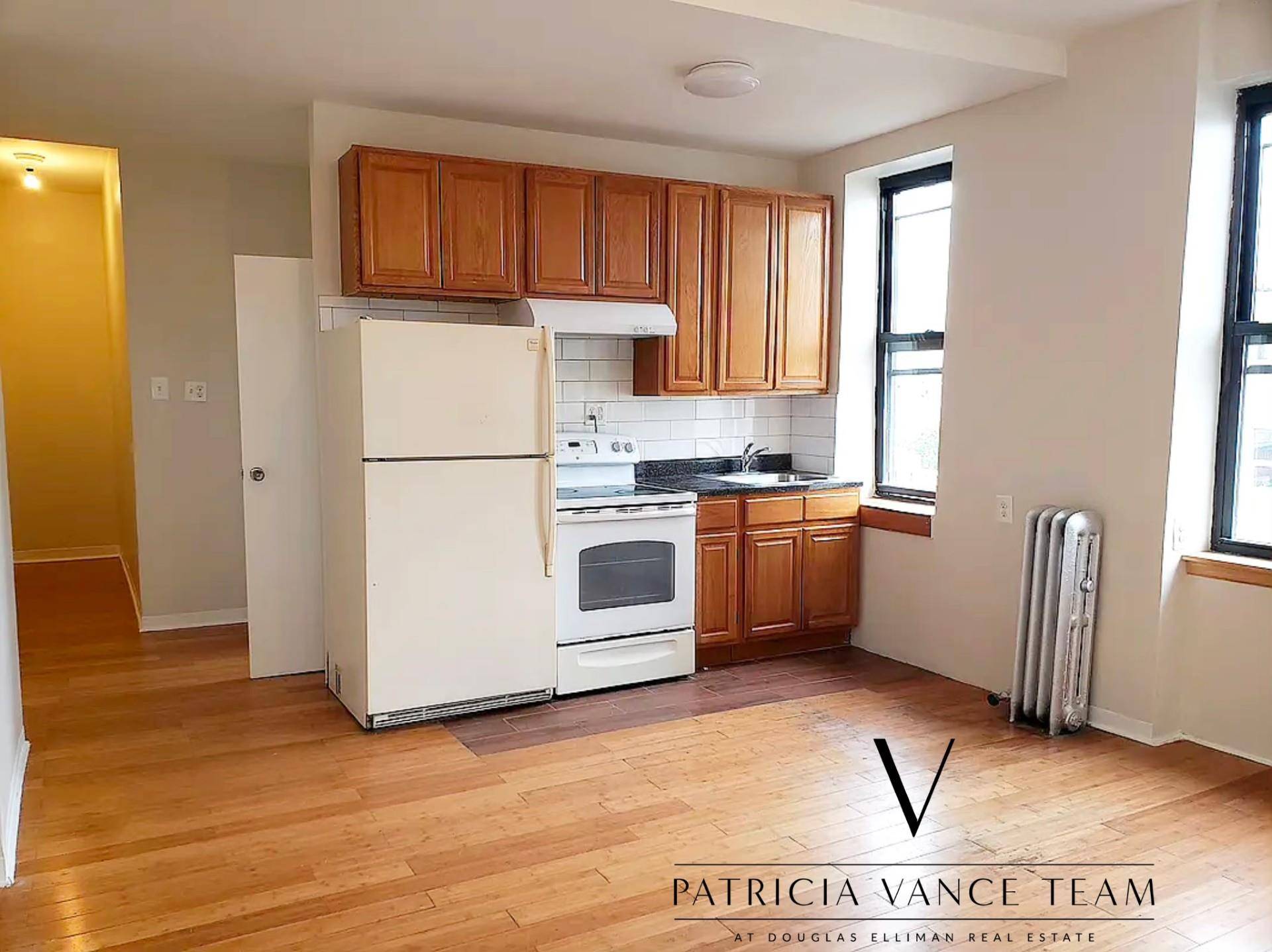 This light filled Williamsburg apartment is on the top floor of this classic NY building.