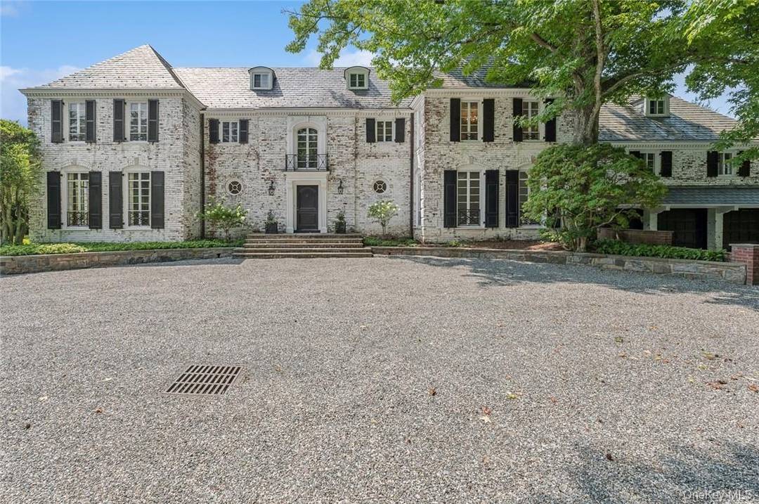 Nestled on 10 ACRES of private property, this Georgian inspired Colonial estate combines timeless elegance with modern luxury, offering a private sanctuary just 30 miles from New York City.