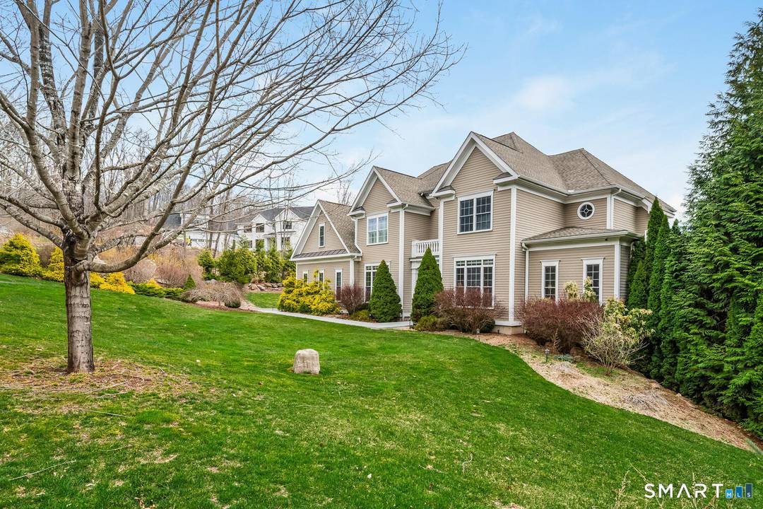 Welcome to 95 Pinto Lane in Monroe a turnkey, custom built luxury home set on 2 private acres in a quiet cul de sac within Hammertown Estates.