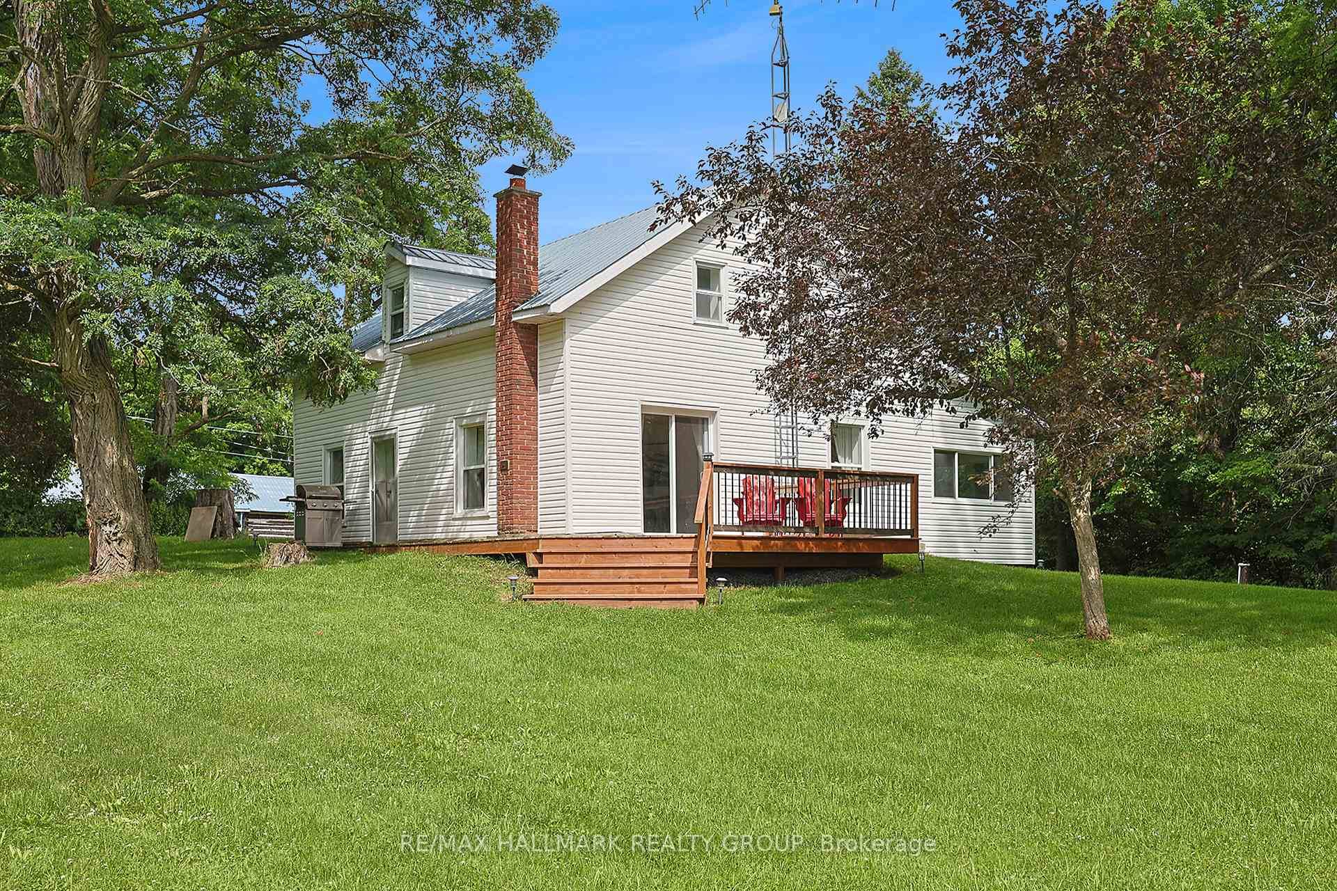 Classic BIG RIDEAU LAKE homestead with 372 feet of crystal clear waterfront.