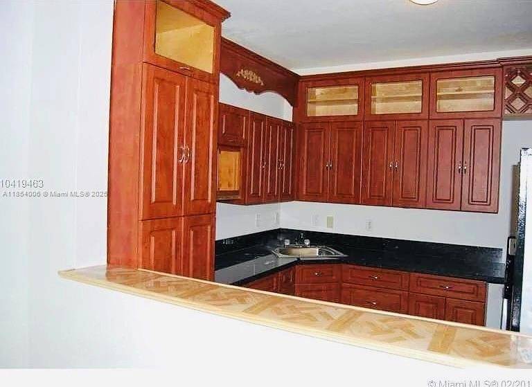 SPACIOUS THREE BEDROOMS PLUS DEN, TWO AND A HALF BATHROOMS.