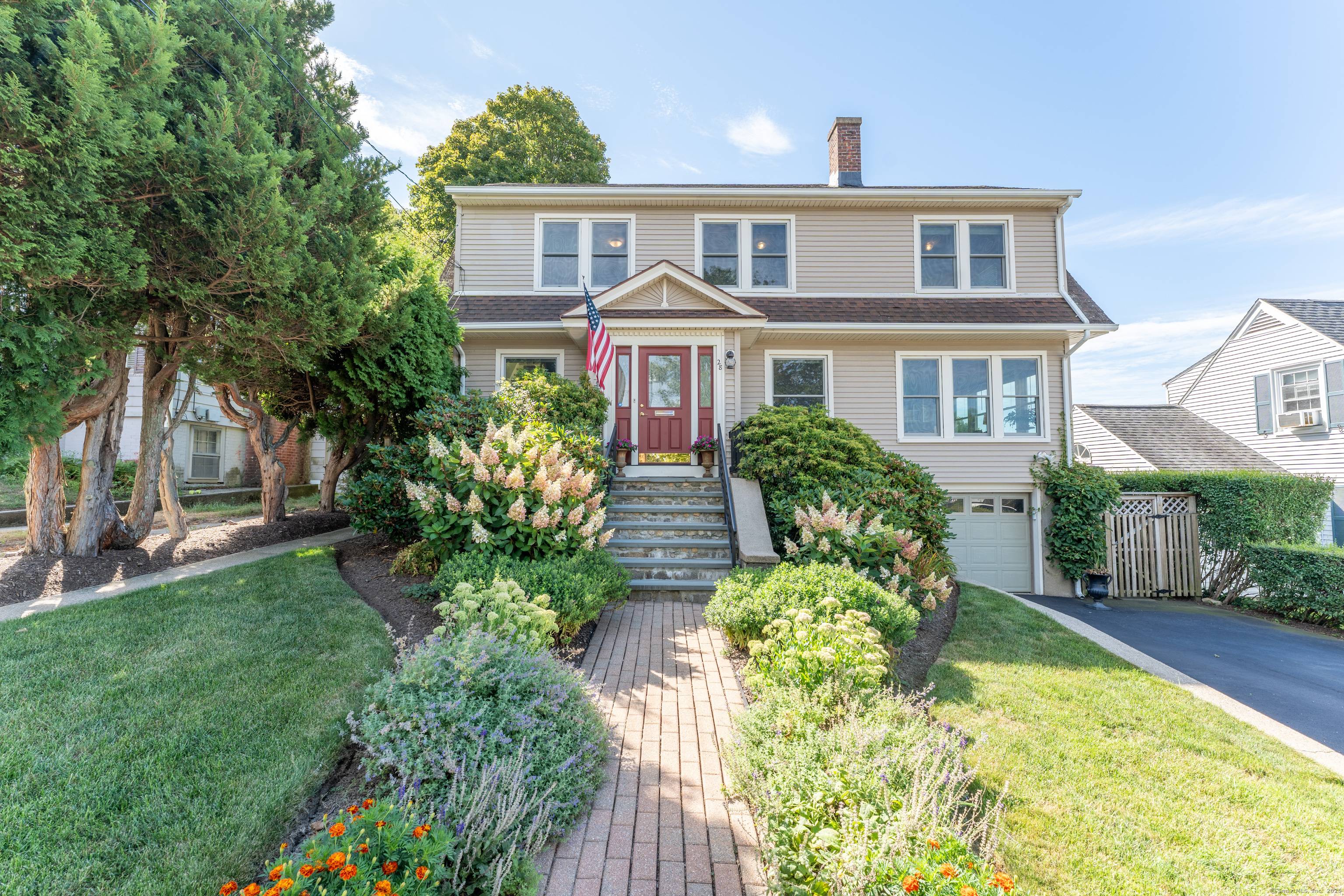 Welcome to 28 Greenway Road, a stunning colonial in the heart of New London, CT.