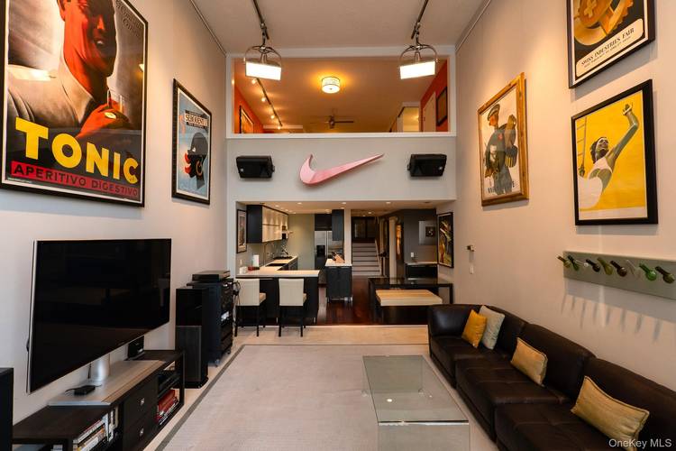 Experience loft style living in this beautifully renovated, fully furnished condo at 1 Landmark Square, the iconic former Life Savers Factory in downtown Port Chester, now known as The Landmark.