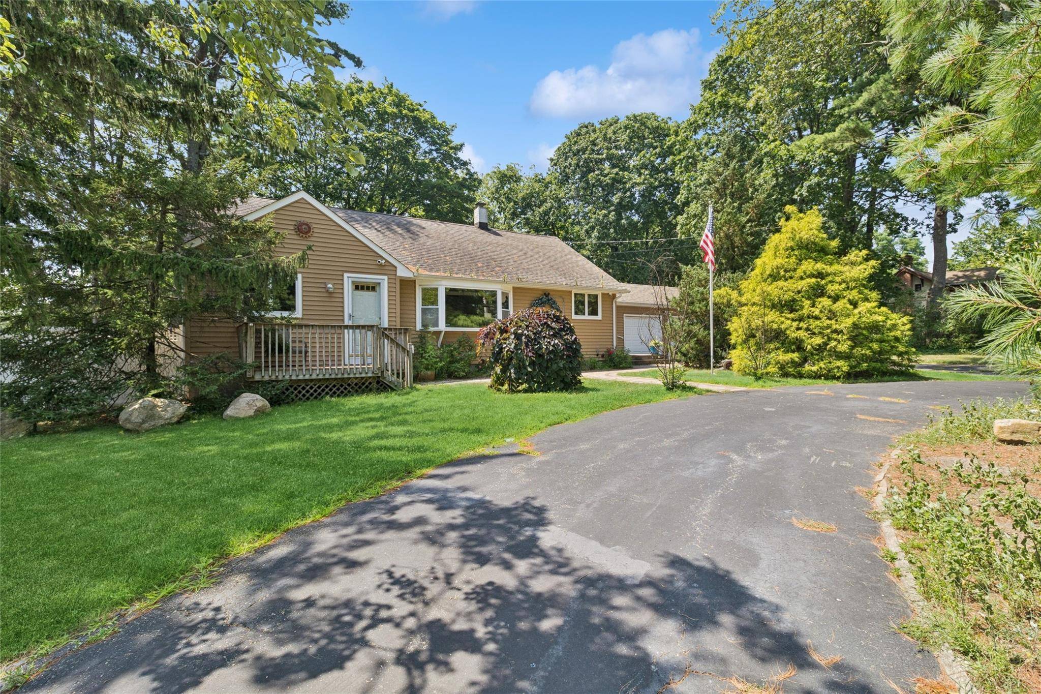 Beautiful 3 bedroom ranch set on a private and expansive 0.