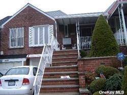 Bright and sunny, fully brick attached Townhouse on a quiet, tree lined street.