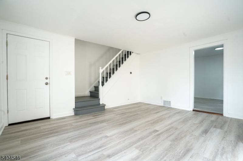 Well maintained brick two family property featuring side by side units, offering added privacy and minimal noise transfer compared to traditional up and down multifamily layouts.