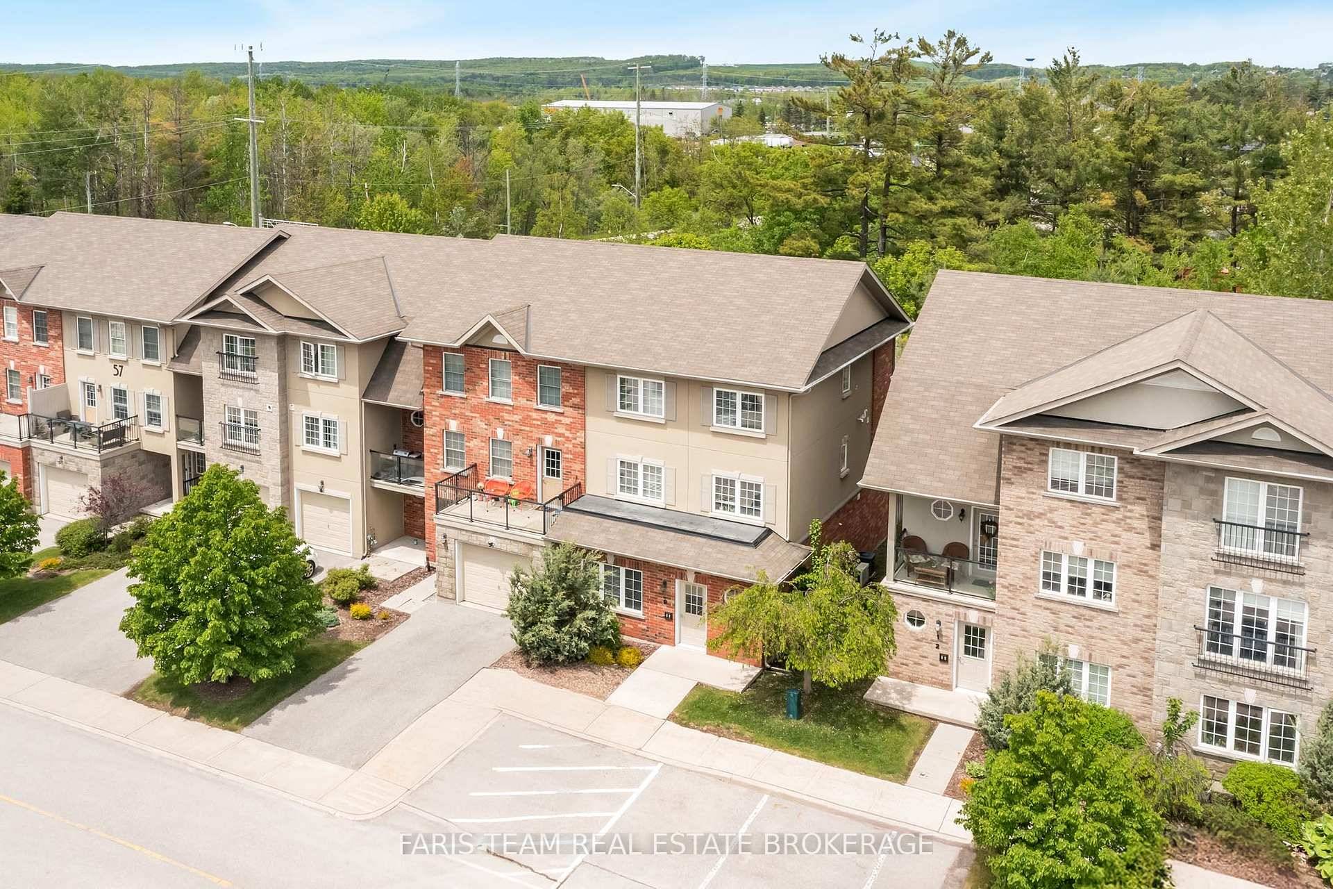 Top 5 Reasons You'll Love This Home 1 Discover the Manhattan Condos with this main level stacked townhouse offering the perfect blend of comfort and convenience, featuring ground floor entry ...