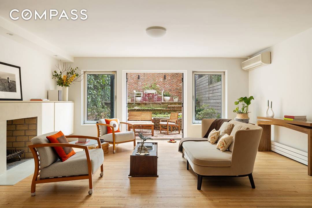 This elegant, turnkey three bedroom garden triplex offers a rare blend of contemporary comfort and charm.