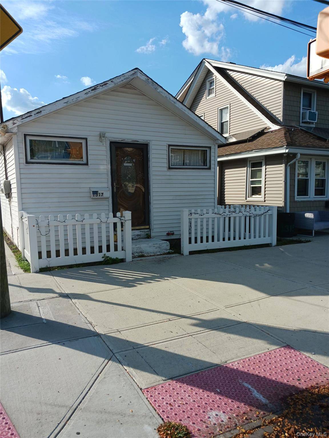 One story, 2 bedroom bungalow on 2, 583 sq ft corner lot 24.