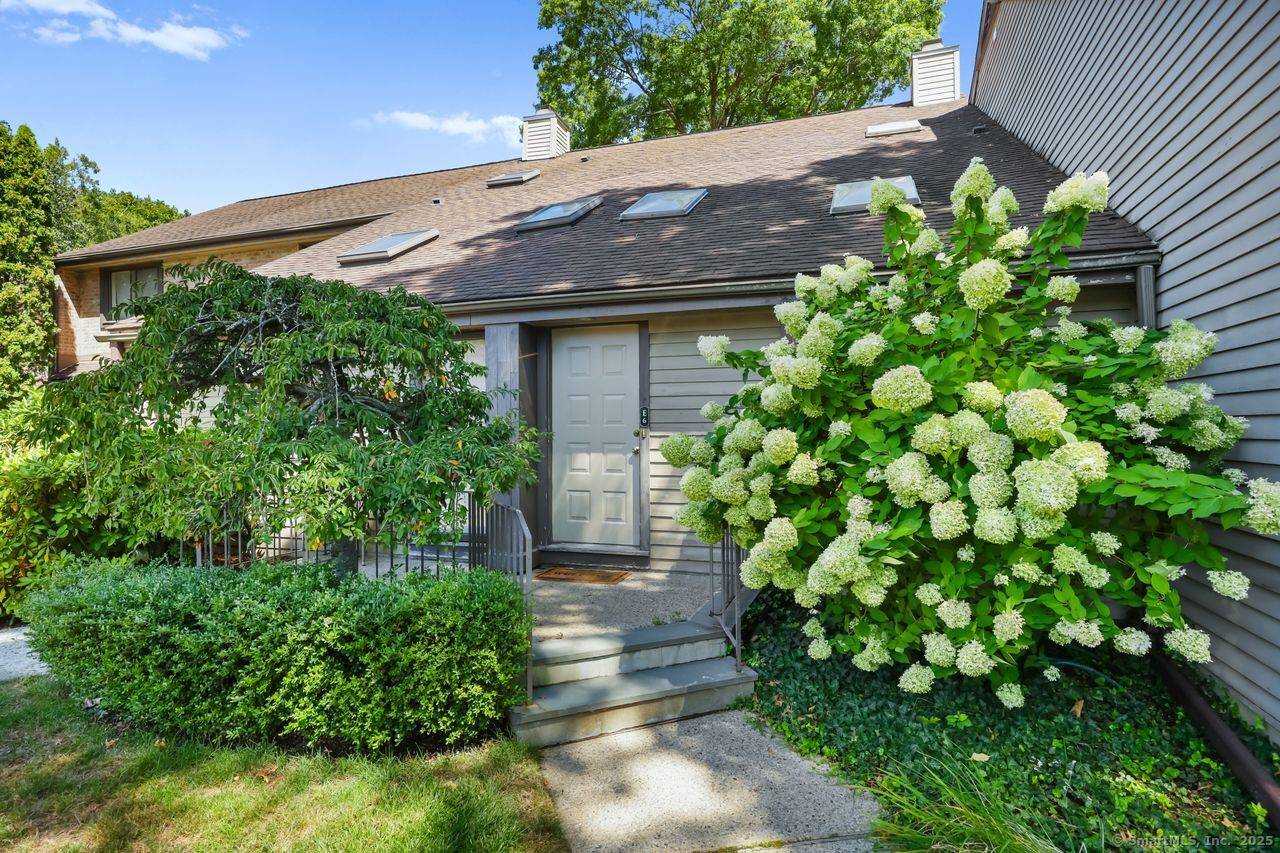 Rare Chesterfield condo with deeded, detached garage with the option to resell separately if desired !