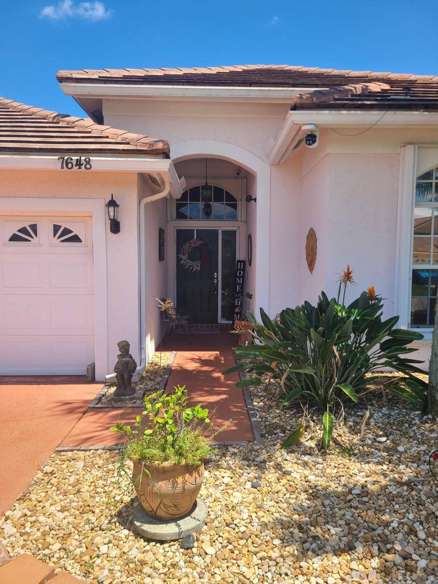 WOW, absolutely beautiful 3 bedroom, 2 bath home with a 2 car garage, inside laundry room, private screened pool, pergola with BBQ area, very private fenced backyard, beautiful wood shutters ...
