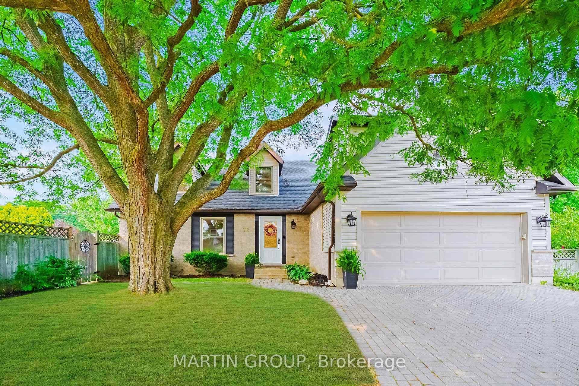 Discover your private oasis in this stunning Cape Cod home, perfectly situated on a wide lot with mature trees in the desirable Kortright West neighbourhood.