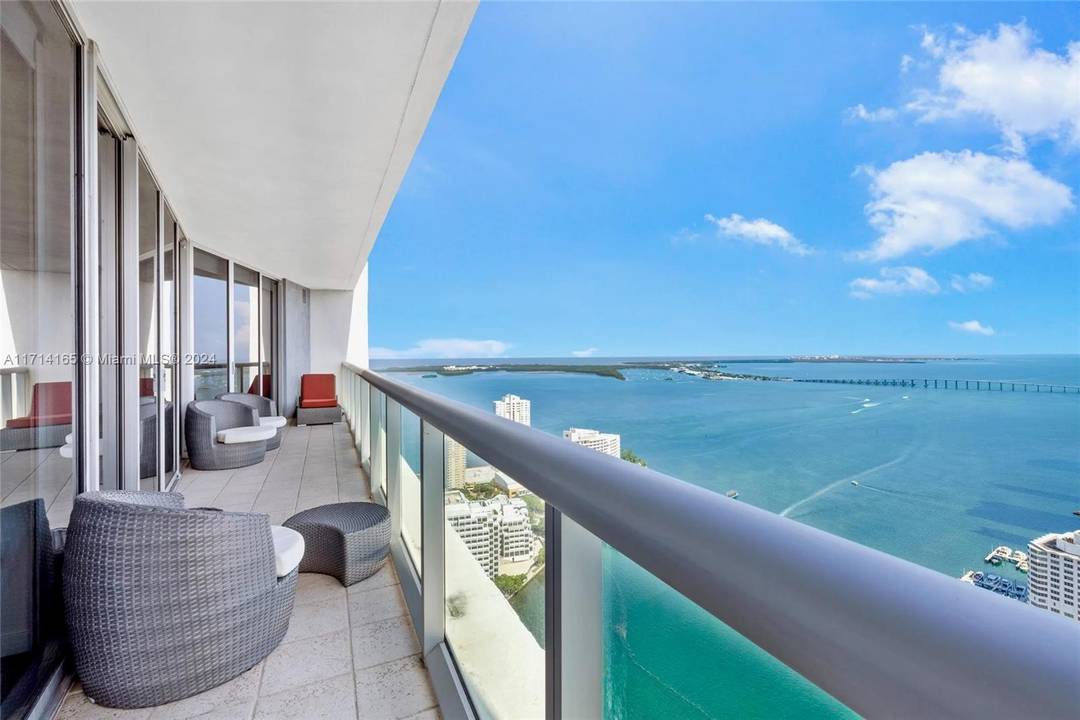 Must see, amazing views of the bay and skyline from this beautifully updated and furnished 2 bedroom 2 bathroom, Plus an office Den.