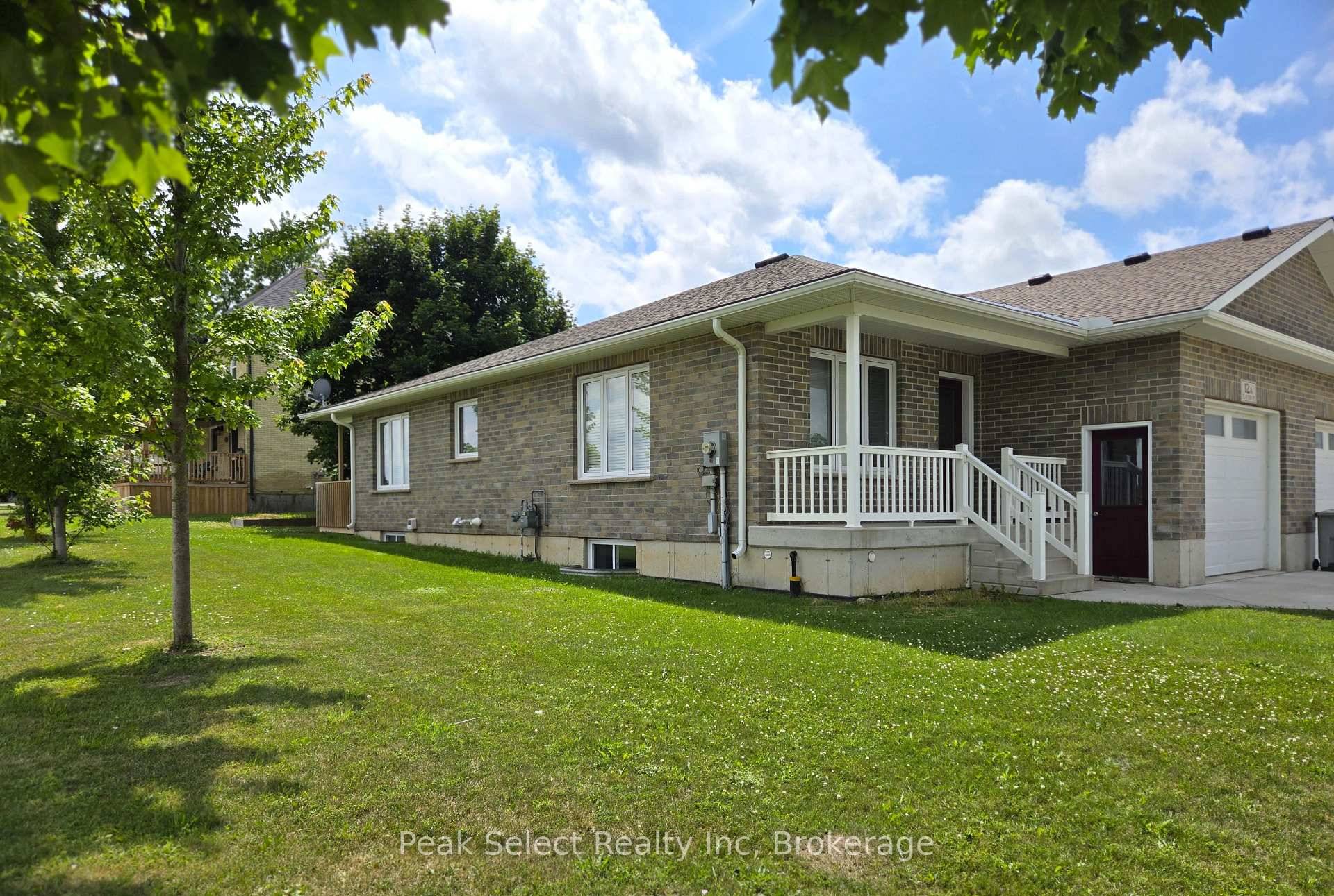 Affordable one floor living in newer 6 year old semi with attached garage in Mitchell.